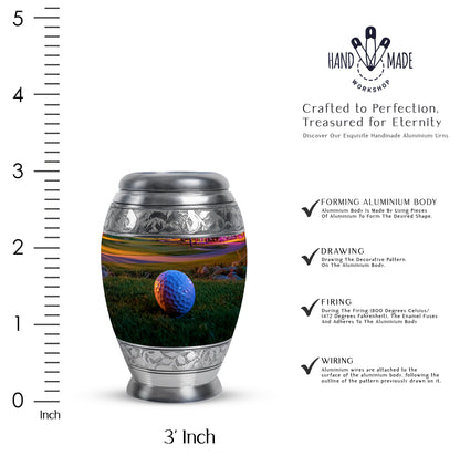 Antique Gold Golf Cremation Urn lifestyle display on memorial shelf - ornate monarch-style golf relief on brushed aluminum - mini keepsake memorial for portion of cremation ashes