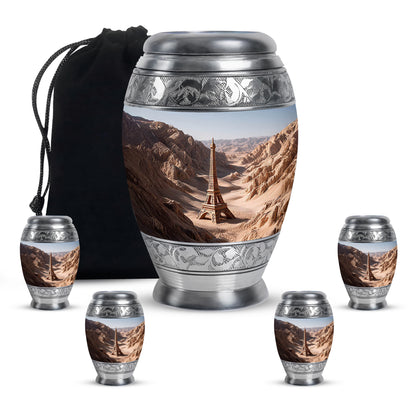 Satin Silver Eiffel Tower Cremation Urn detail view - ornate monarch-style eiffel tower relief on brushed aluminum - memorial set with one large and four small urns