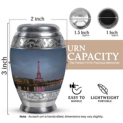 Steel Blue Eiffel Tower Cremation Urn lifestyle display on memorial shelf - royal eiffel tower engraving with decorative scrollwork - mini keepsake memorial for portion of cremation ashes