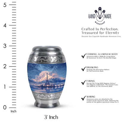 Sky Blue Eiffel Tower Cremation Urn lifestyle display on memorial shelf - ornate monarch-style eiffel tower relief on brushed aluminum - mini keepsake memorial for portion of cremation ashes