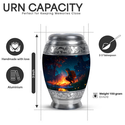 Celestial Blue Campfire Cremation Urn lifestyle display on memorial shelf - ornate monarch-style campfire relief on brushed aluminum - mini keepsake memorial for portion of cremation ashes