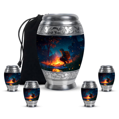 Sky Blue Campfire Cremation Urn detail view - ornate monarch-style campfire relief on brushed aluminum - memorial set with one large and four small urns