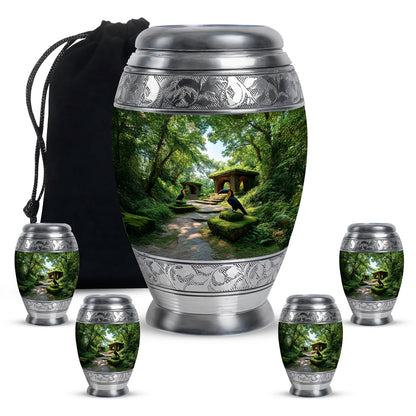 Forest Green Hornbill Cremation Urn detail view - majestic hornbill pattern with filigree border - memorial set with one large and four small urns