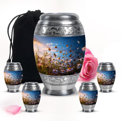 Sapphire Blue Daisy Cremation Urn detail view - royal daisy engraving with decorative scrollwork - memorial set with one large and four small urns