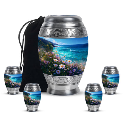 Calming Blue Daisy Cremation Urn detail view - majestic daisy pattern with filigree border - memorial set with one large and four small urns