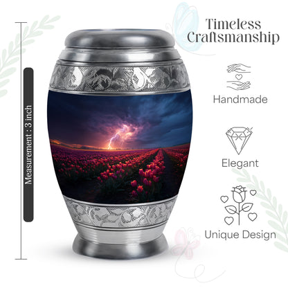 Icy Blue Garden Tulip Cremation Urn lifestyle display on memorial shelf - ornate monarch-style garden tulip relief on brushed aluminum - mini keepsake memorial for portion of cremation ashes