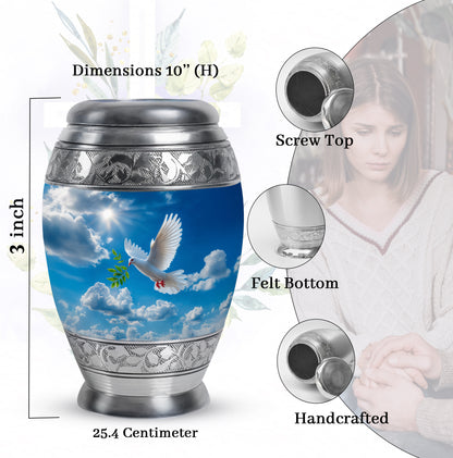 Slate Blue Dove Cremation Urn lifestyle display on memorial shelf - regal dove design with crown-inspired accents - mini keepsake memorial for portion of cremation ashes