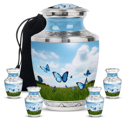 Cornflower Blue Butterfly Cremation Urn lifestyle display on memorial shelf - stylized abstract butterfly pattern with bold lines - memorial set with one large and four small urns