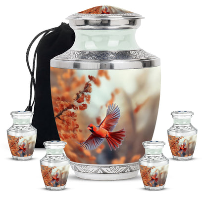Warm Gold Cardinal Cremation Urn lifestyle display on memorial shelf - stylized abstract cardinal pattern with bold lines - memorial set with one large and four small urns