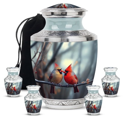 Mist Gray Cardinal Cremation Urn lifestyle display on memorial shelf - modern art-inspired cardinal motif on sleek aluminum - memorial set with one large and four small urns
