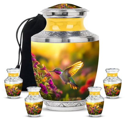 Champagne Gold Hummingbird Cremation Urn lifestyle display on memorial shelf - modern art-inspired hummingbird motif on sleek aluminum - memorial set with one large and four small urns