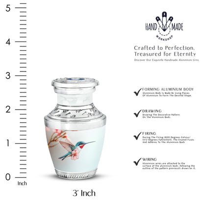 Gleaming Silver Hummingbird Cremation Urn top-down view of secure threaded lid - modern art-inspired hummingbird motif on sleek aluminum - mini keepsake memorial for portion of cremation ashes
