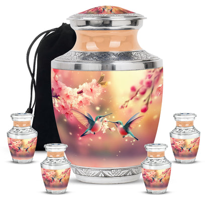 Harvest Gold Hummingbird Cremation Urn lifestyle display on memorial shelf - stylized abstract hummingbird pattern with bold lines - memorial set with one large and four small urns