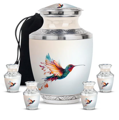 Frosted Silver Hummingbird Cremation Urn lifestyle display on memorial shelf - artistic hummingbird interpretation with creative detail - memorial set with one large and four small urns