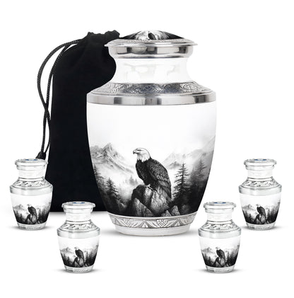Gleaming Silver Eagle Cremation Urn lifestyle display on memorial shelf - contemporary eagle design with modern artistic flair - memorial set with one large and four small urns