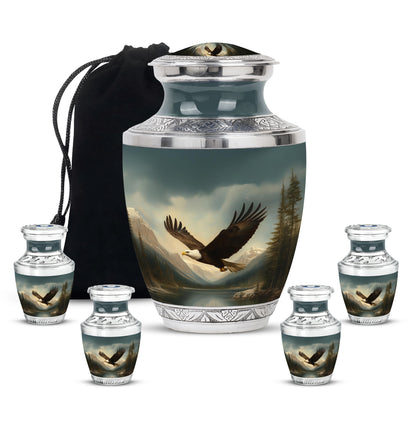 Obsidian Black Eagle Cremation Urn lifestyle display on memorial shelf - stylized abstract eagle pattern with bold lines - memorial set with one large and four small urns