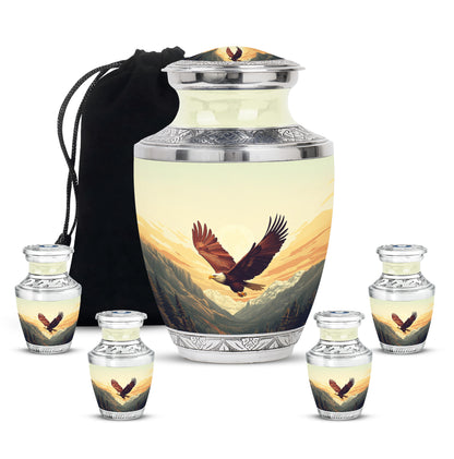 Burnished Gold Eagle Cremation Urn lifestyle display on memorial shelf - stylized abstract eagle pattern with bold lines - memorial set with one large and four small urns