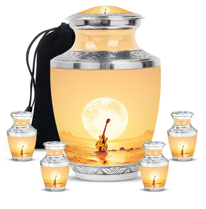 Amber Gold Guitar Cremation Urn lifestyle display on memorial shelf - modern art-inspired guitar motif on sleek aluminum - memorial set with one large and four small urns