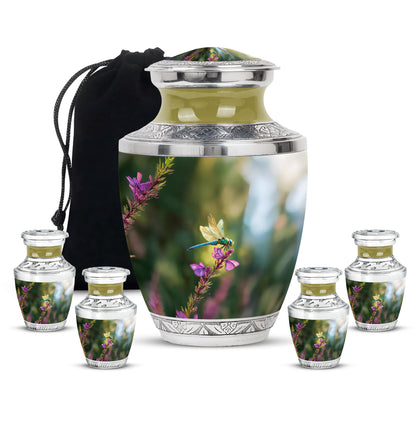 Emerald Green Dragonfly Cremation Urn lifestyle display on memorial shelf - modern art-inspired dragonfly motif on sleek aluminum - memorial set with one large and four small urns