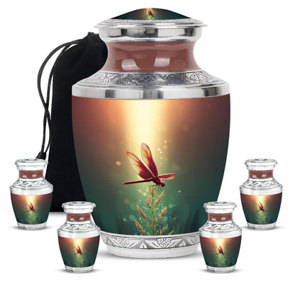 Warm Gold Dragonfly Cremation Urn lifestyle display on memorial shelf - stylized abstract dragonfly pattern with bold lines - memorial set with one large and four small urns