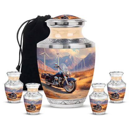 Royal Gold Bike Cremation Urn lifestyle display on memorial shelf - stylized abstract bike pattern with bold lines - memorial set with one large and four small urns