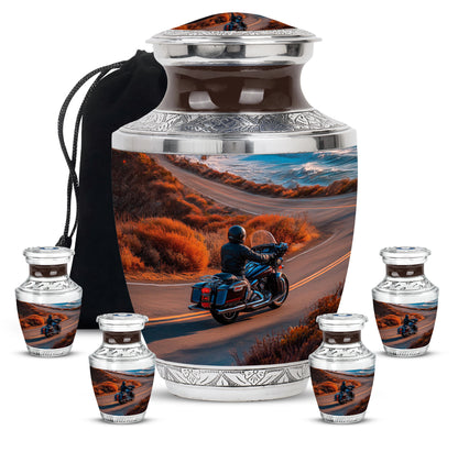 Matte Gold Bike Cremation Urn lifestyle display on memorial shelf - stylized abstract bike pattern with bold lines - memorial set with one large and four small urns