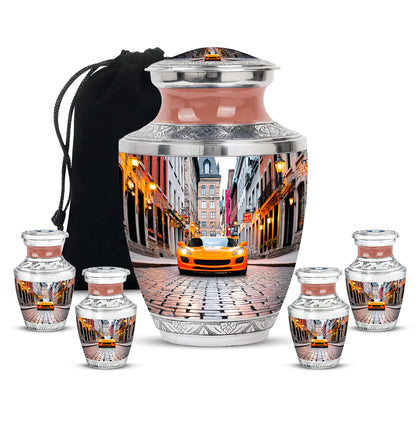 Porcelain White Car Cremation Urn lifestyle display on memorial shelf - stylized abstract car pattern with bold lines - memorial set with one large and four small urns