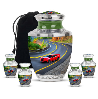 Rich Black Car Cremation Urn lifestyle display on memorial shelf - modern art-inspired car motif on sleek aluminum - memorial set with one large and four small urns
