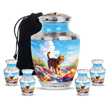 Soft Blue Cat Cremation Urn lifestyle display on memorial shelf - stylized abstract cat pattern with bold lines - memorial set with one large and four small urns