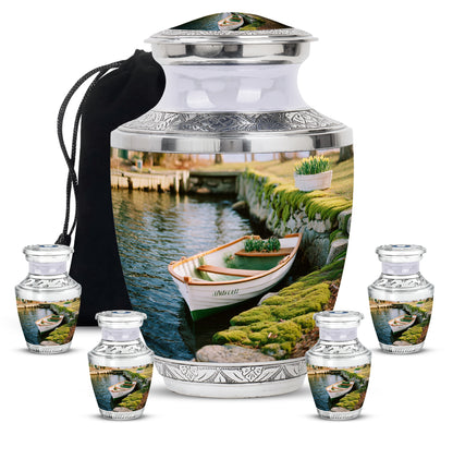 Lemon Yellow Boat Cremation Urn lifestyle display on memorial shelf - stylized abstract boat pattern with bold lines - memorial set with one large and four small urns
