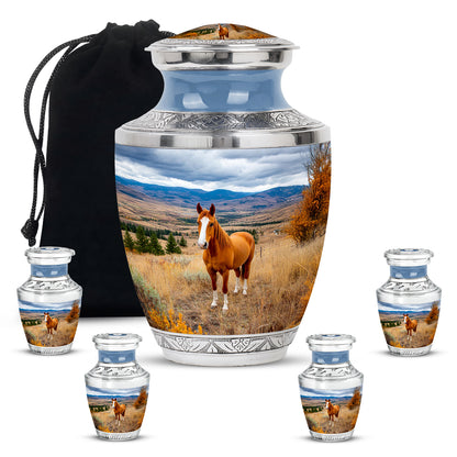Vivid Blue Horse Cremation Urn lifestyle display on memorial shelf - stylized abstract horse pattern with bold lines - memorial set with one large and four small urns