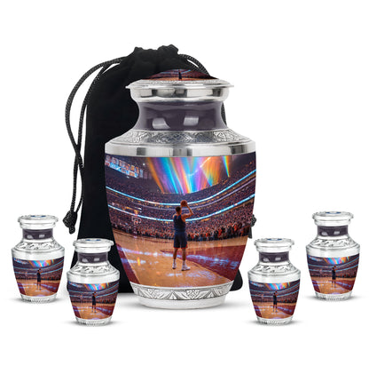 Dark Black Basketball Cremation Urn lifestyle display on memorial shelf - artistic basketball interpretation with creative detail - memorial set with one large and four small urns