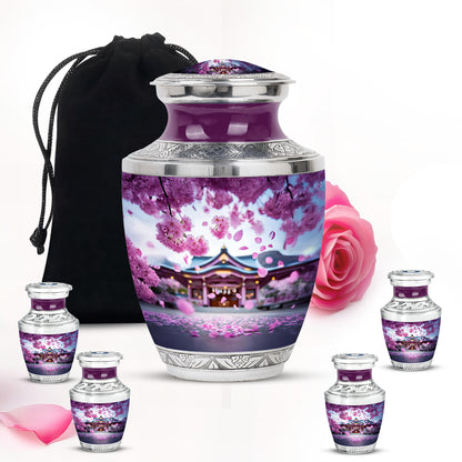Blush Pink Cherry Blossom Cremation Urn lifestyle display on memorial shelf - contemporary cherry blossom design with modern artistic flair - memorial set with one large and four small urns