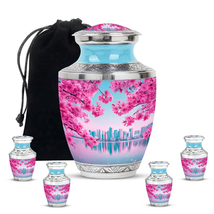 Ocean Teal Cherry Blossom Cremation Urn lifestyle display on memorial shelf - modern art-inspired cherry blossom motif on sleek aluminum - memorial set with one large and four small urns