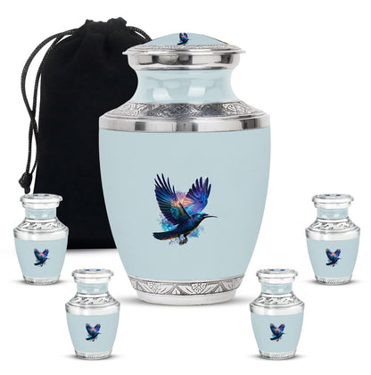 Antique Silver Crow Cremation Urn lifestyle display on memorial shelf - artistic crow interpretation with creative detail - memorial set with one large and four small urns