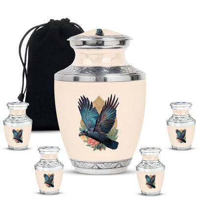 Matte Gold Crow Cremation Urn lifestyle display on memorial shelf - artistic crow interpretation with creative detail - memorial set with one large and four small urns