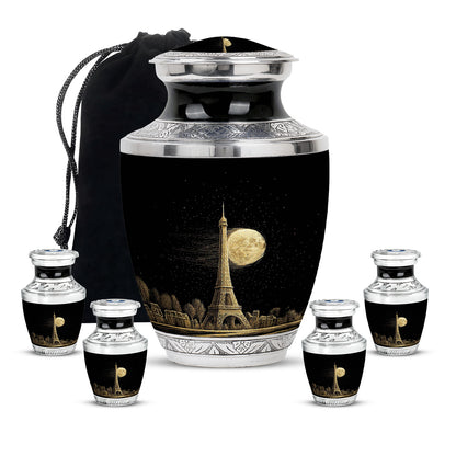 Glossy Black Eiffel Tower Cremation Urn lifestyle display on memorial shelf - modern art-inspired eiffel tower motif on sleek aluminum - memorial set with one large and four small urns