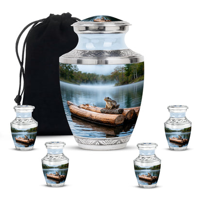 Sterling Silver Frog Cremation Urn lifestyle display on memorial shelf - contemporary frog design with modern artistic flair - memorial set with one large and four small urns
