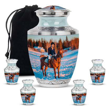 Polished Silver Horse Polo Cremation Urn lifestyle display on memorial shelf - stylized abstract horse polo pattern with bold lines - memorial set with one large and four small urns