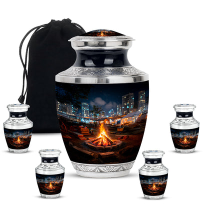 Charcoal Black Campfire Cremation Urn lifestyle display on memorial shelf - stylized abstract campfire pattern with bold lines - memorial set with one large and four small urns