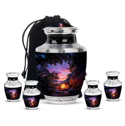 Jet Black Campfire Cremation Urn lifestyle display on memorial shelf - modern art-inspired campfire motif on sleek aluminum - memorial set with one large and four small urns