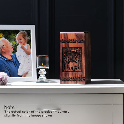 Large wooden urn featuring an elephant design, suitable for storing adult male human ashes.