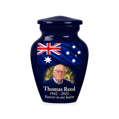 One navy blue ringless 3-inch keepsake urn with an upper Australian flag banner and a fictional sample portrait below on white.