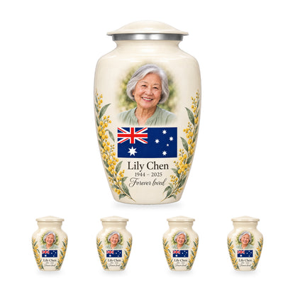One ivory adult Australian flag urn with four matching ringless keepsakes, showing the 10-inch and 3-inch sizes together.
