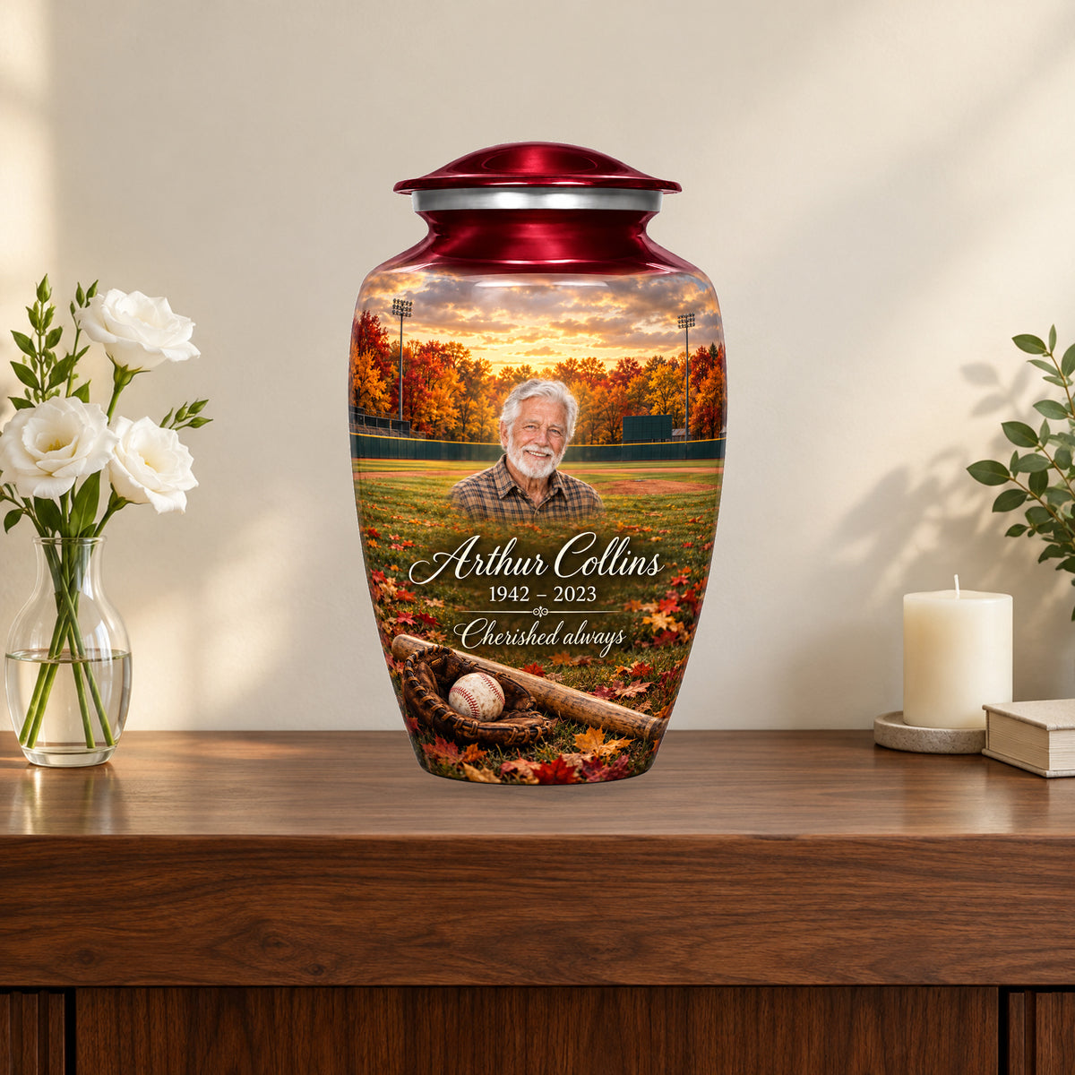 Autumn Ballpark personalized baseball urn on a memorial console with flowers and candle; props not included.