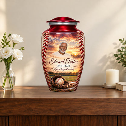 Crimson Stitch personalized baseball urn on a memorial console with flowers and candle; props not included.
