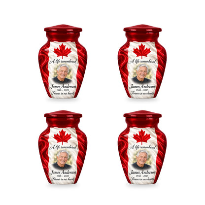 Four matching red Canadian flag keepsake urns with sample photo and inscription.