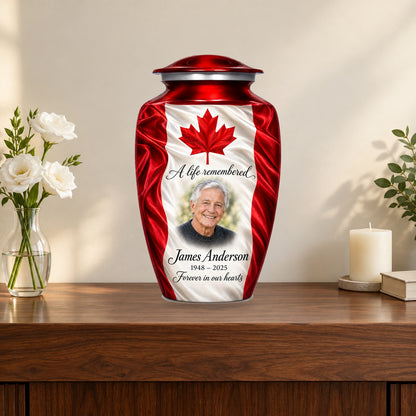 Red personalized Canadian flag adult urn on a memorial console.