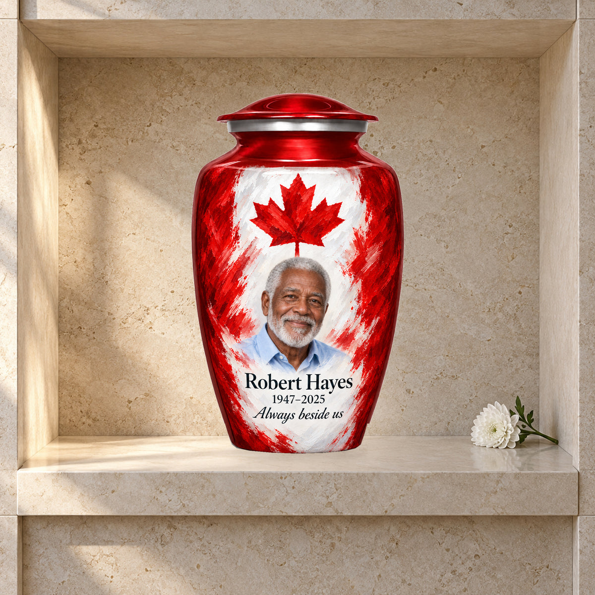 Red adult urn with Painterly Canadian Tribute Canadian flag artwork displayed in a columbarium niche.
