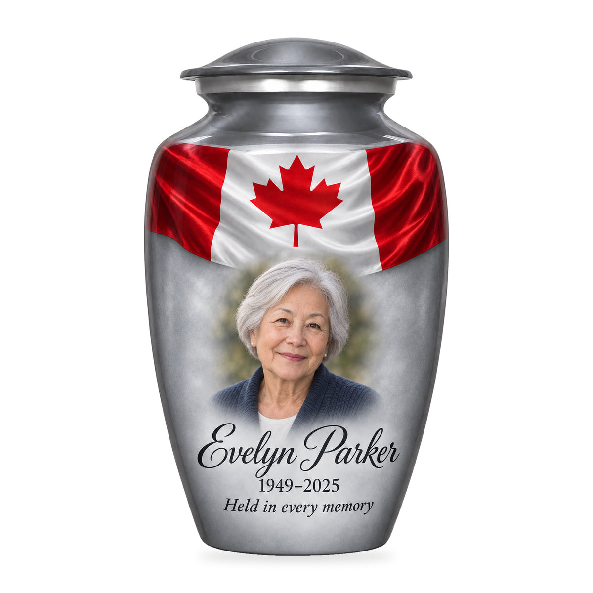 Gray adult urn with Silver Flag Remembrance Canadian flag artwork, fictional sample portrait and personalized inscription on white.